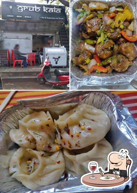 Check out the photo displaying food and interior at Grub Kala