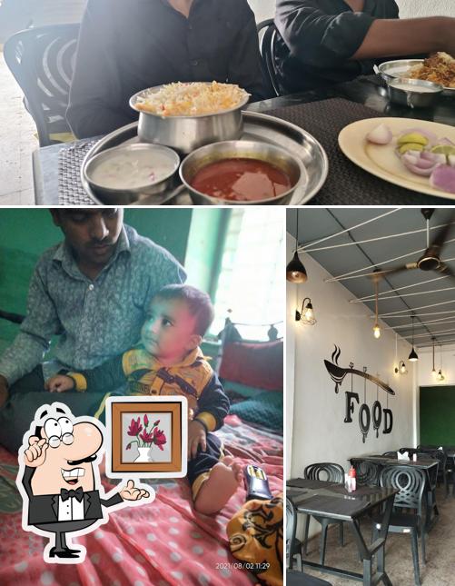 Among different things one can find interior and food at S B Biryani House