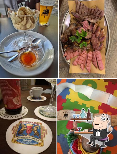 Questa è la immagine che presenta la interni e cibo di Brasseria del Grifone