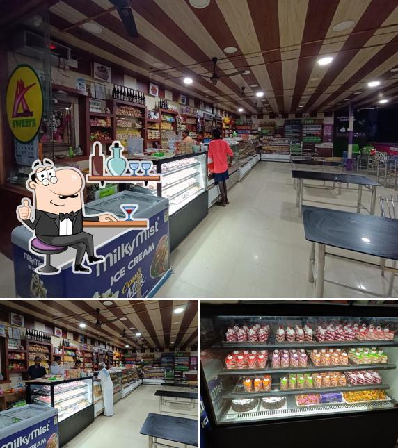 Take a seat at one of the tables at Sri Sindhu Restaurant ஸ்ரீ சிந்து உணவகம்