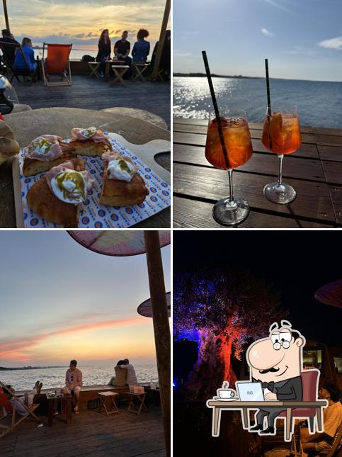 La foto della interni e cibo di Karma Beach Bar