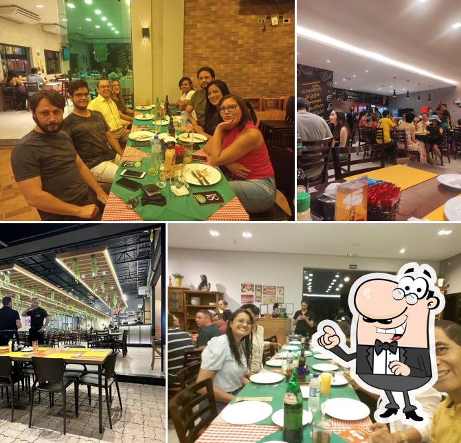 Sente em uma das mesas no Pedaço da Pizza Rodízio