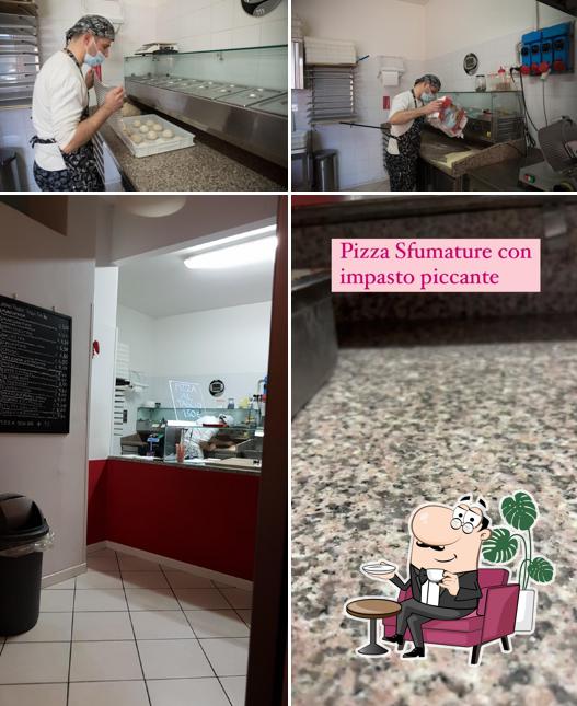 Dai un'occhiata agli interni di Pizzeria 50 Sfumature di Pizza