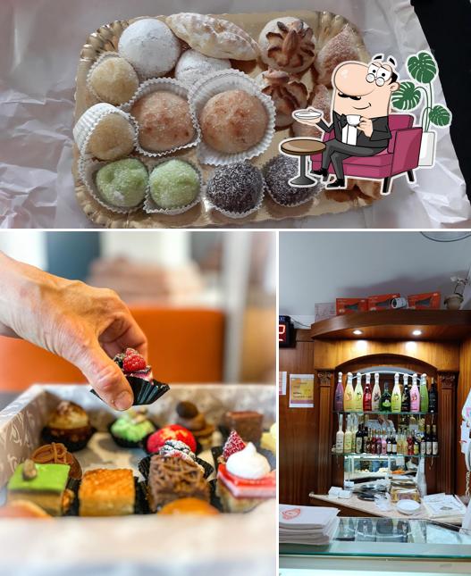 Questa è la immagine che presenta la interni e cibo di Antica Pasticceria del Convento