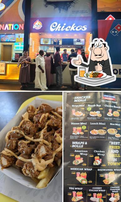 This is the image depicting food and interior at Chickos fried chicken