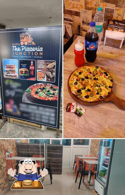 Take a look at the picture depicting food and interior at THE PIZZERIA JUNCTION (BY NIKKY)