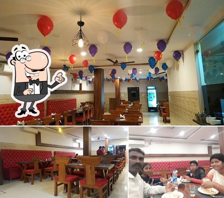 Take a seat at one of the tables at Tandooriwala BBQ Restaurant