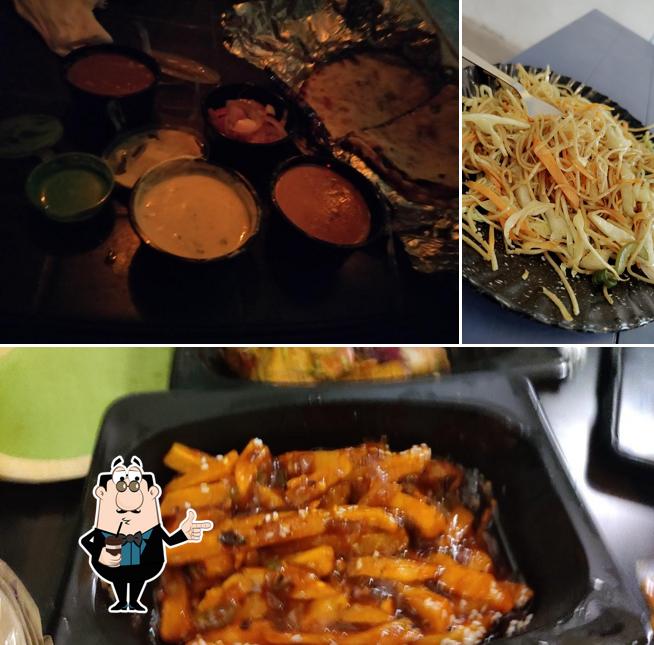 Enjoy a drink at Foodie Forest Manali Full Night Food Delivery