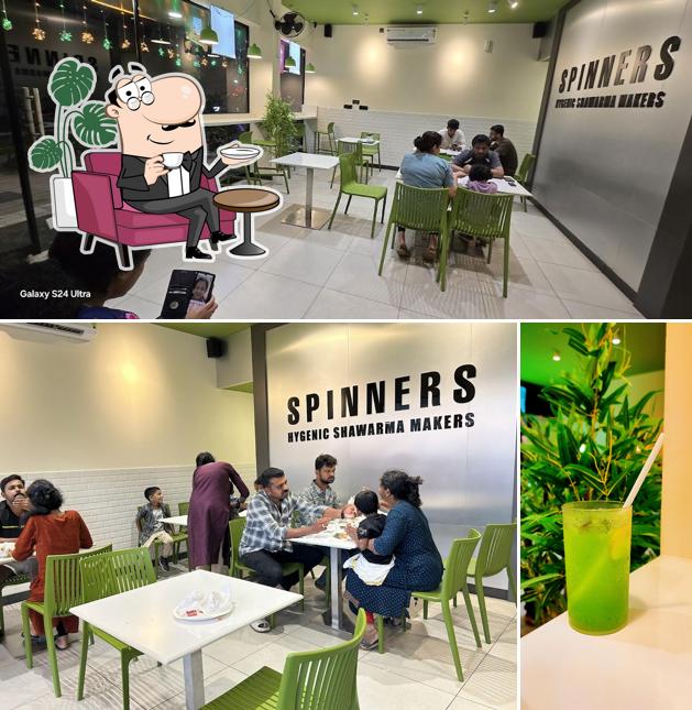 Take a seat at one of the tables at Spinners Hygenic Shawarma Makers Adoor