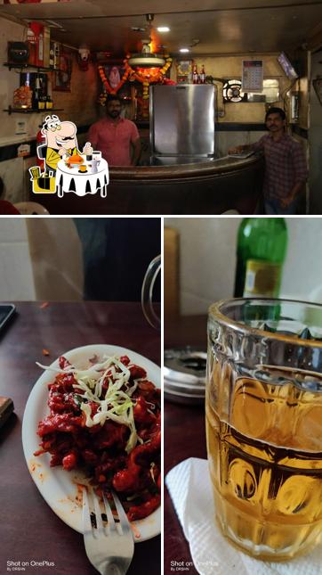 The photo of food and bar counter at Sai Darsh Hotel