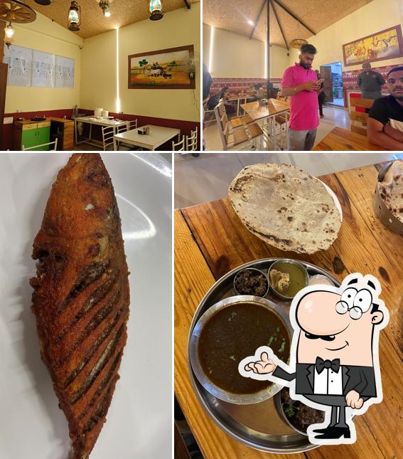 The picture of interior and food at Hotel Gawali Wada