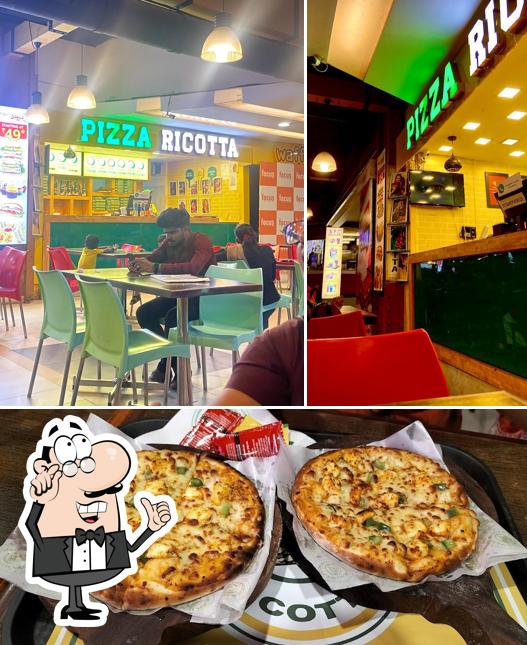 The picture of Pizza Ricotta Focus Mall’s interior and food