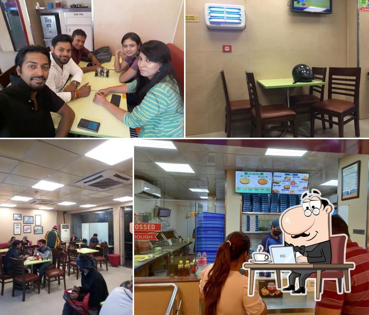 The interior of Domino's Pizza Yamuna Vihar, New Delhi