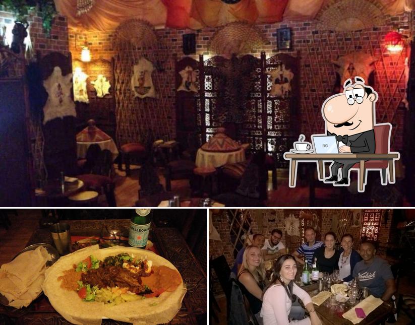 Questa è la immagine che presenta la interni e cibo di Ristorante Warsà