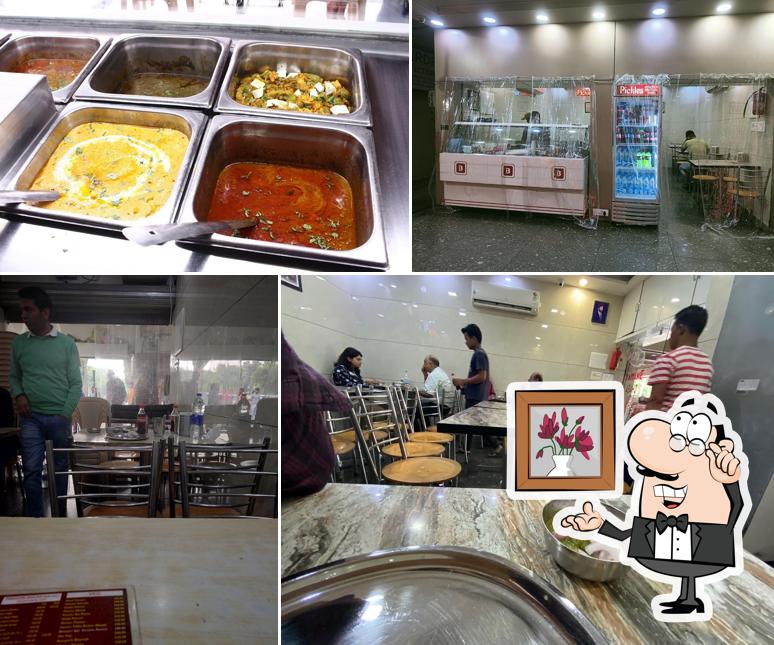 Take a seat at one of the tables at Bhatia's Food Court & Kebab Dhaba