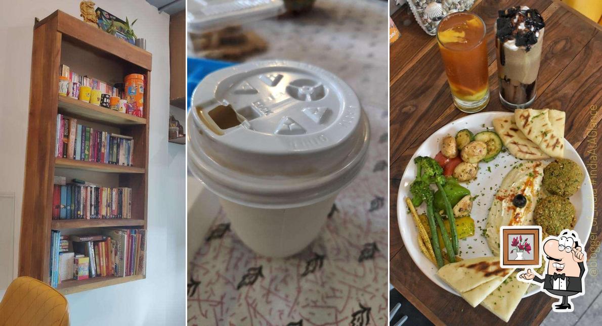 Take a seat at one of the tables at Coffee Bond Noida Sector 29