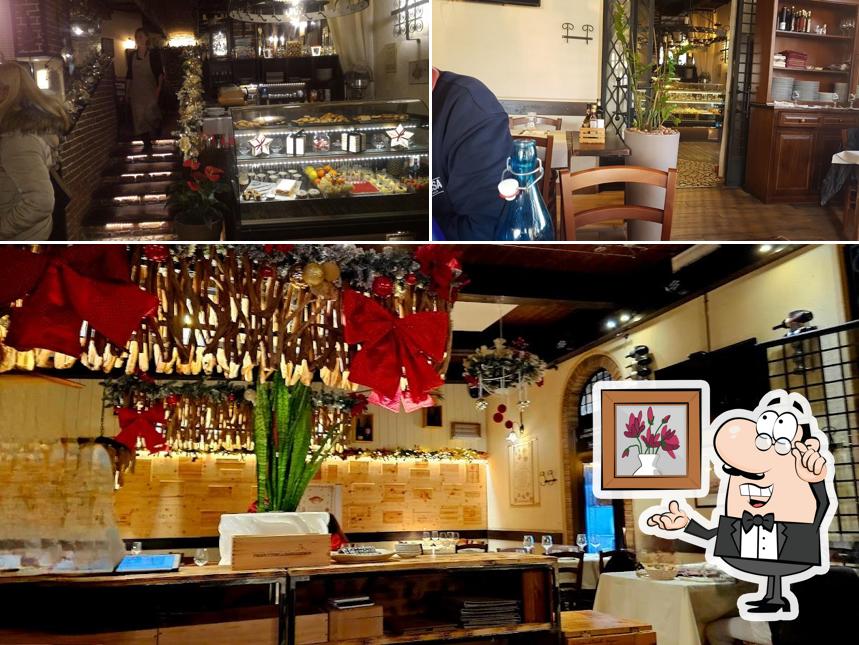 Siediti a un tavolo di Osteria Trattoria al Cenacolo
