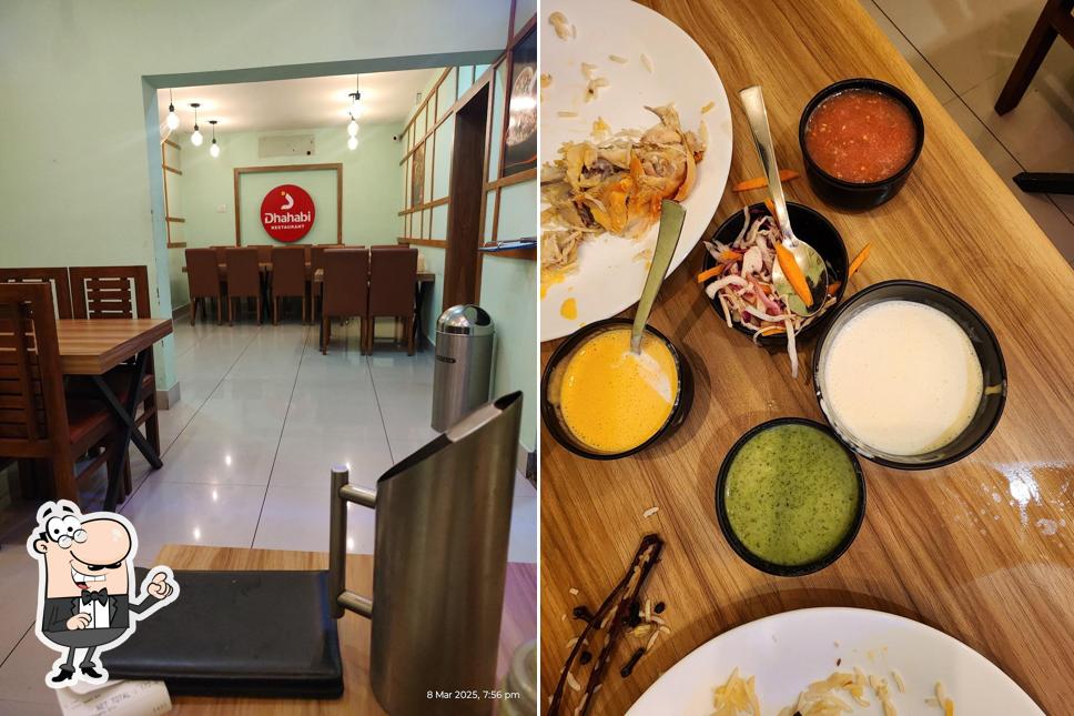 Take a seat at one of the tables at Dhahabi Restaurant