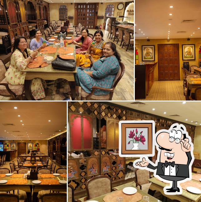 Take a seat at one of the tables at The Royal Maharaja Palace