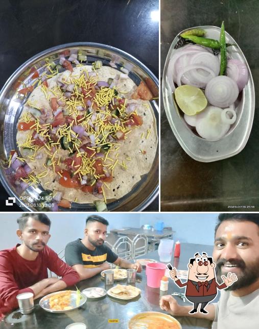 The photo of Satluj Punjabi Hotel’s food and dining table