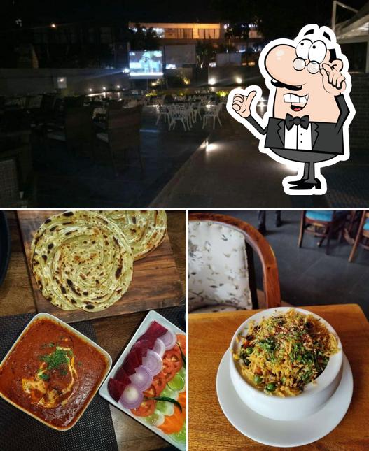 Take a seat at one of the tables at The Clover - Bar Kitchen Banquets