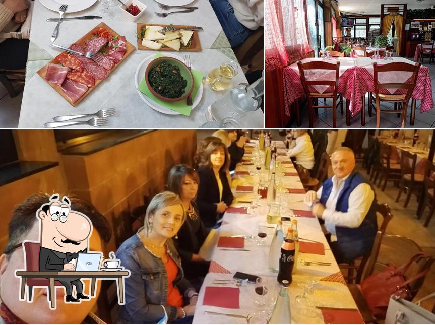 Siediti a un tavolo di Vecchia Hosteria Del Lago