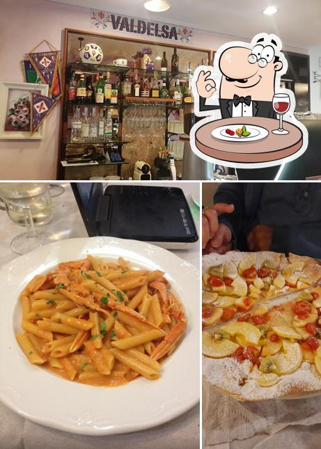 Pizzeria Ristorante Maroni Di Maroni Daniela si caratterizza per la cibo e bancone da bar