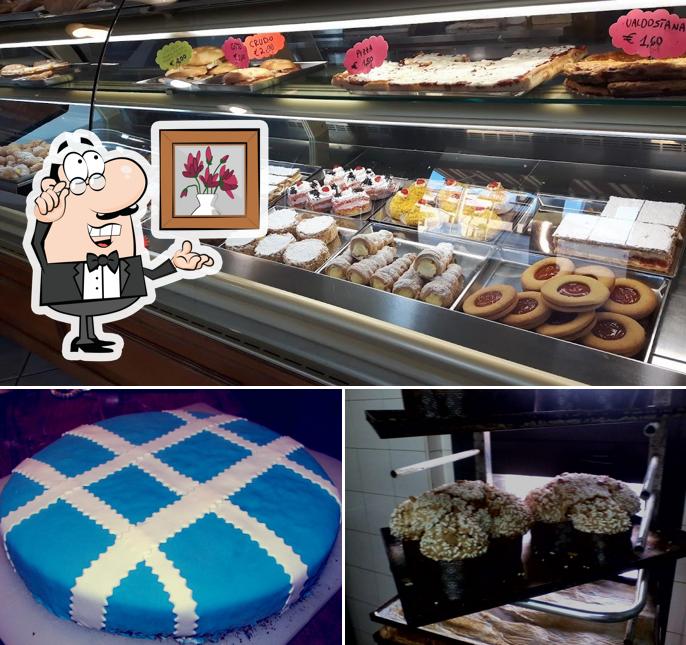Questa è la foto che raffigura la interni e cibo di Caffe' Pasticceria Mignon