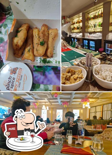 This is the image depicting food and interior at Pinch of Spice Dwarka