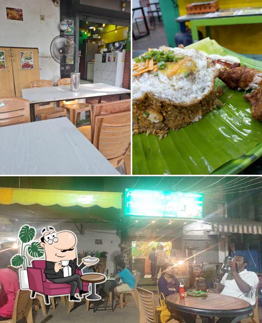 Take a seat at one of the tables at Abang Raju's Nasi Goreng