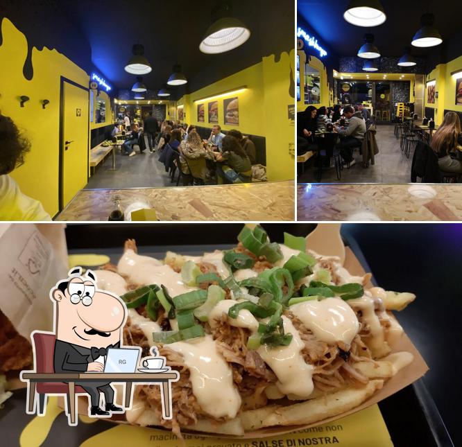 Norma's Burger Bar si caratterizza per la interni e cibo