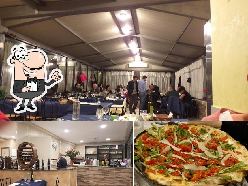 Dai un’occhiata alla immagine che presenta la interni e cibo di Ristorante Pizzeria Al Sorriso