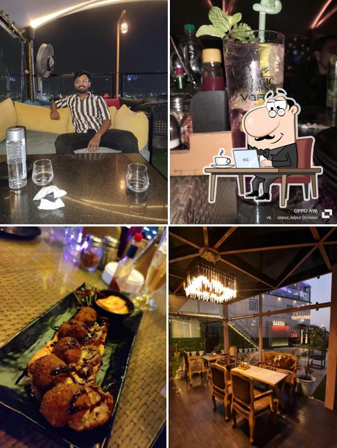 Take a seat at one of the tables at Zarza Club and Terrace Jaipur