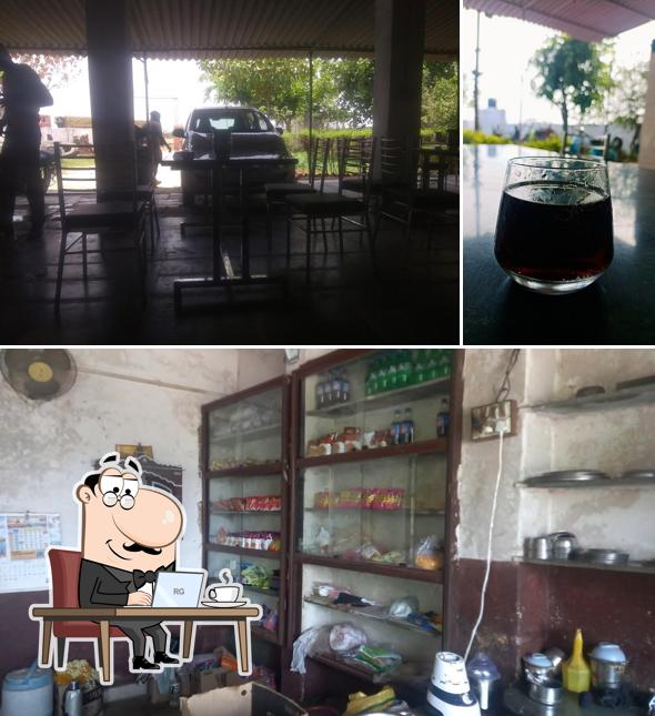 Take a seat at one of the tables at Shekhawat Restaurant