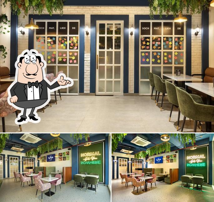 Take a seat at one of the tables at Chai Break - Siliguri