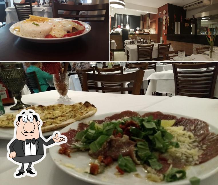 Sente em uma das mesas no Dom Sebastião