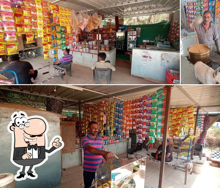 Take a look at the photo depicting interior and food at Bapa sitaram pan