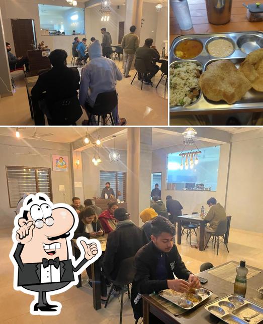The picture of interior and food at The food basket
