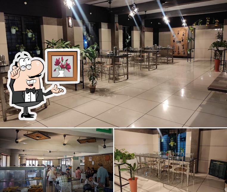 Take a seat at one of the tables at Womens food court, Patturaikkal jn