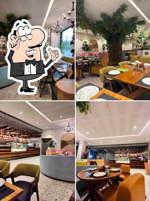 The interior of HK's woodfire Pizza Pizza Cafe in Navsari