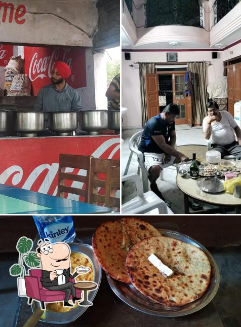 Among various things one can find interior and pizza at Happy Dhaba