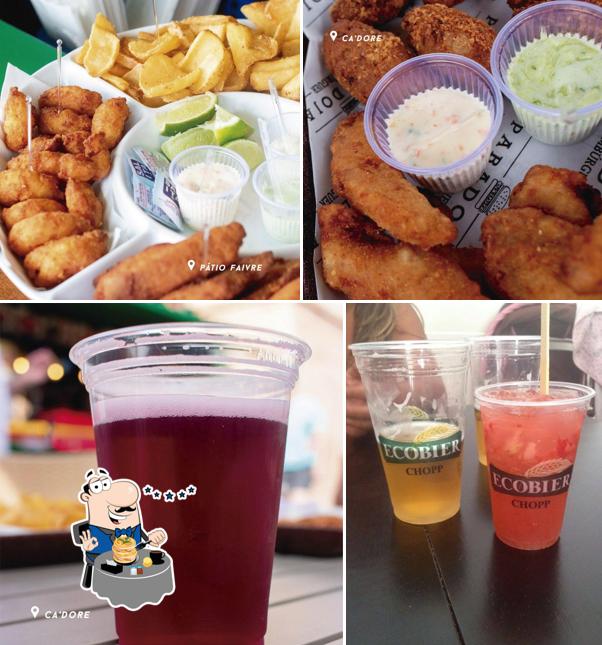 Entre diversos coisas, comida e bebida podem ser encontrados no Paradoja Karaokê Bar