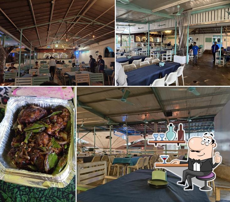 Take a seat at one of the tables at Bacchus Inn