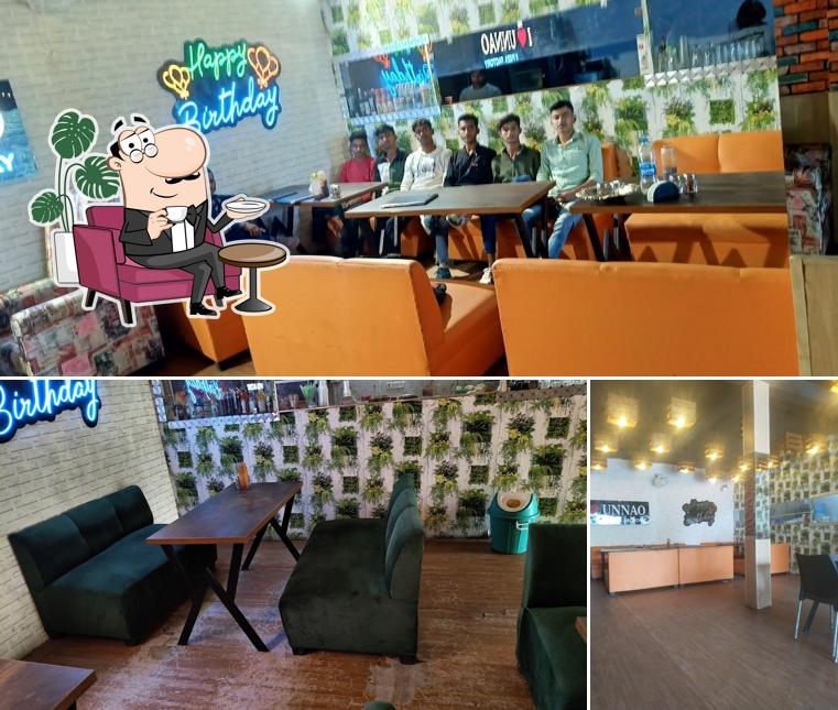 Take a seat at one of the tables at PIZZA FACTORY
