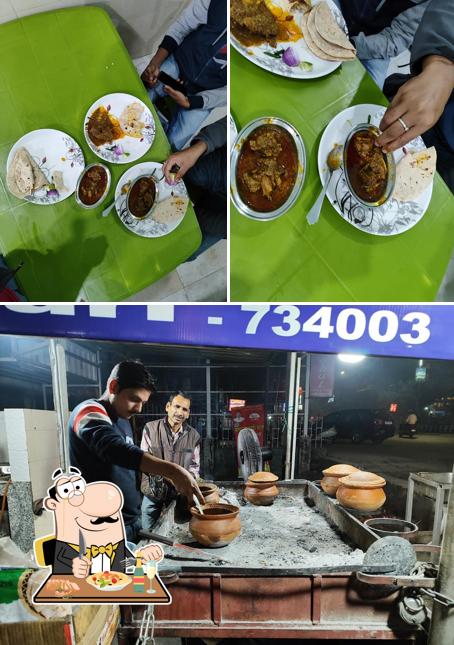 The photo of Puja Champaran Handi Mutton’s food and exterior