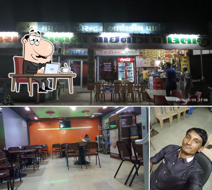The interior of Madhuram Restaurant &fastfood
