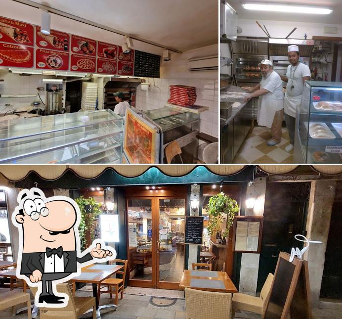 Dai un'occhiata agli interni di Aurora Pizza & Kebab