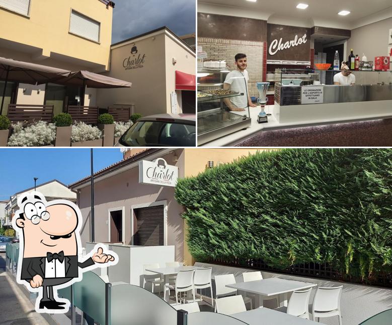 Dai un'occhiata agli interni di Charlot Artigiani Della Pizza