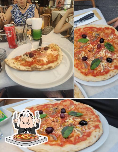 Prenditi una pizza a Amigos Bar