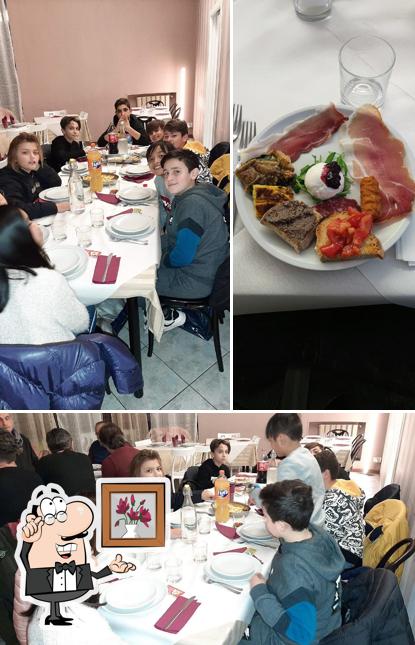 Dai un'occhiata agli interni di Trattoria Pizzeria "il Gatto E La Volpe"